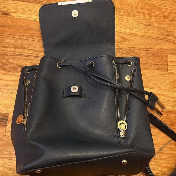 Stylish blue faux leather backpack with ample space for essentials! - Picture 6 of 6